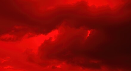 Dramatic red sky filled with dark ominous clouds creating a fiery and intense atmosphere during a storm