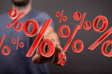 Person interacting with floating percentage symbols.  Perfect for discount, sale, finance, and...