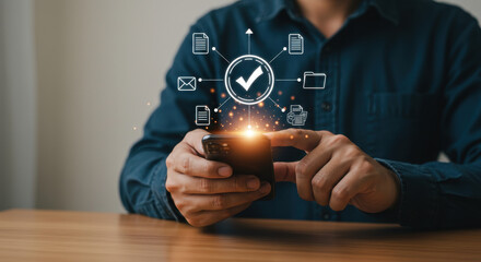 Data Management via Mobile: A man in his 30s uses a smartphone for document control and verification with a digital checklist.