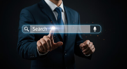 Digital search: A businessman in a suit taps a virtual search bar, engaging with innovative online technology.
