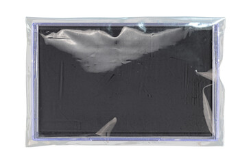 Old cassette tape case on black background. Isolated music transparent mockup. Clean cover box...
