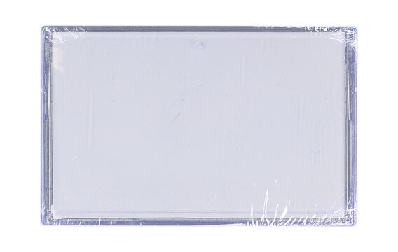 Old cassette tape case on black background. Isolated music transparent mockup. Clean cover box template.