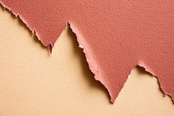 Torn paper reveals a contrasting color underneath creating an abstract textured surface.