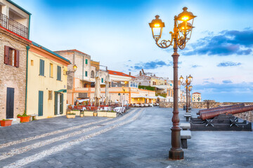 Amazing evening cityscape of historical part of Alghero town.