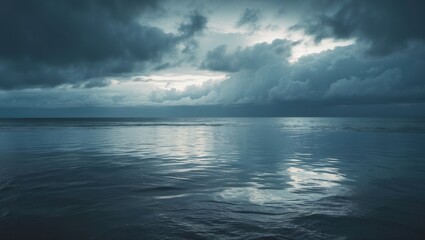 Obraz premium Seascape Featuring Reflection of Clouds With Blank Space for Text