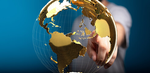 Abstract image of a hand interacting with a golden globe, representing global connections and...