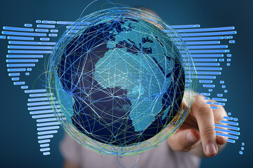 Hand interacting with a digital globe, showcasing global network connections and data flow.
