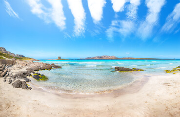 Unbelivable morning view of famous La Pelosa beach and rocky shore near Torre della Pelosa