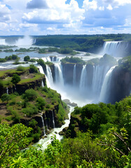 A breathtaking section of The Iguazu Falls viewed from Argentina's lush national park, dinamic scene. with white shades