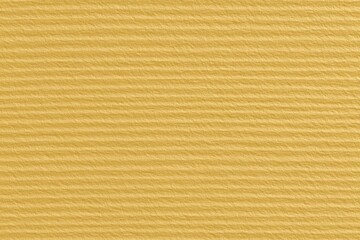 Corrugated cardboard surface texture in yellow or gold color with horizontal lines.