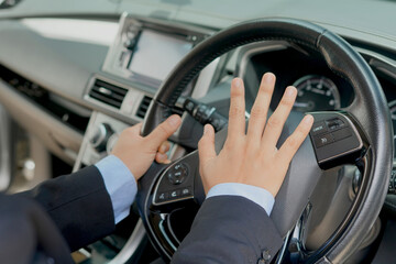 The sudden sound of a car horn startled pedestrians and they turned to look.