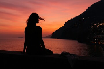Tranquil sunset with silhouette in serene coastal scene