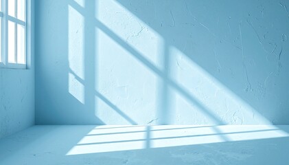Obraz premium A bright, airy white room featuring striking blue walls and large windows that allow natural light to flood in, creating a serene atmosphere.