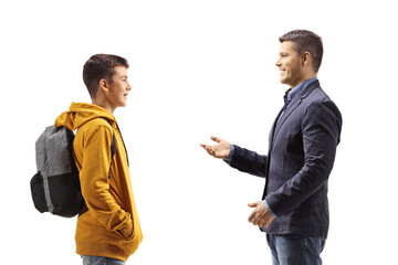 Father talking to his teenage student son