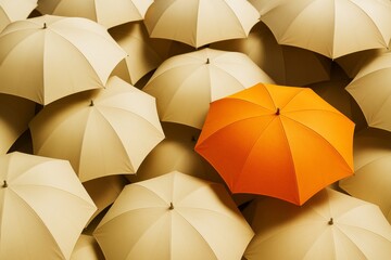 Orange umbrella standing out among many beige umbrellas in a creative composition with soft light and elegant background tones.