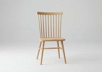 Light wood spindle back chair isolated on white background in studio setting