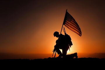 Soldier kneeling with American flag during sunset in solemn remembrance