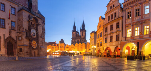 Historic Old Town Square with city buildings at dawn in Prague Czech Republic