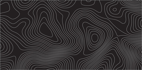  A detailed topographic map pattern featuring thin gray contour lines on a solid black background, indicating varying elevations of a landscape. © feroj