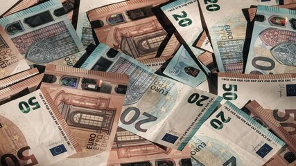 Des billets de 20 euros et de 50 euros avec déplacement latéral  - Powered by Adobe