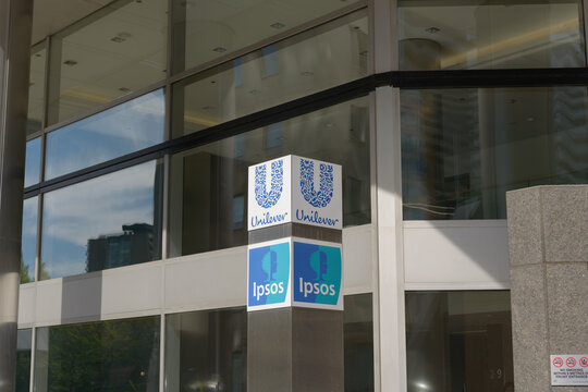 exterior building and signs of Unilever Canada and Ipsos Canada, located at 160 Bloor Street East, Toronto