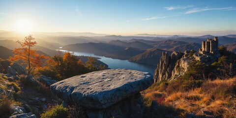 Sunset View Over Mountain Landscape with Lake and Ruins