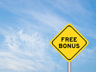 Yellow transportation sign with word free bonus on blue color sky background