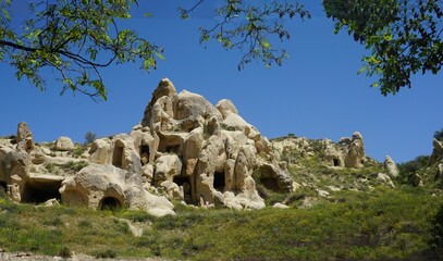 02_These are the bizarre rock formations in the village of Goreme in Cappadocia, Turkey.