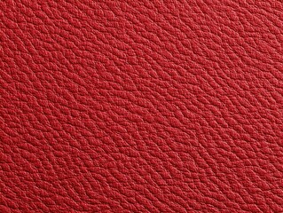 Red leather texture macro close-up with soft grain light.