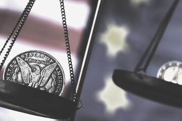 US Dollar and Euro coins on antique mechanical weighing scale as symbol of money exchange rate. Economic and monetary system concept.