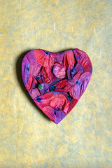 red heart on paper background
