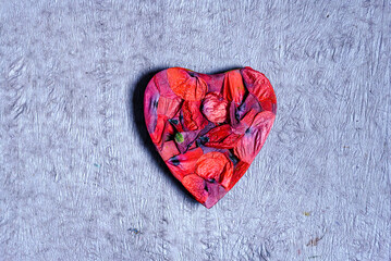 red heart on paper background