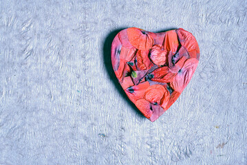 red heart on paper background