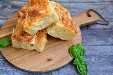 Bakery .Home made  cheese pie  with phyllo pastry, feta cheese  and organic eggs. Bulgarian banitsa