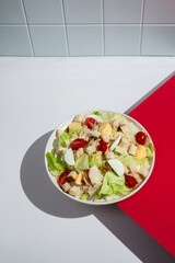 Delicious Caesar Salad with Fresh Ingredients on a White Plate