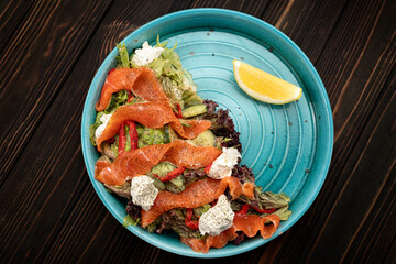 Salmon salad with mixed greens and cream cheese
