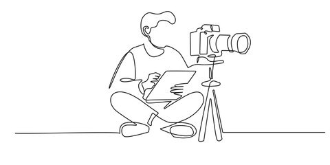 one continuous line drawing of male content creator.facing camera,writing content plan.for digital business
