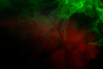 Obraz premium Orange and red steam on a black background.