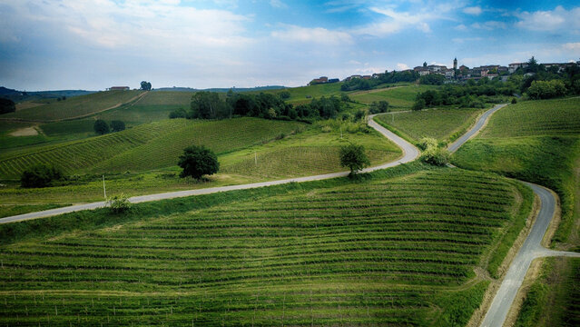 Aerial view of the a hilltop village and rolling Hills near Mombaruzzo, Monferrato, Asti, Piedmont, Italy