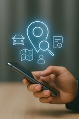 A hand holds a smartphone displaying a glowing location pin surrounded by car, map, magnifying glass, and user profile icons, representing mobile navigation and travel apps.