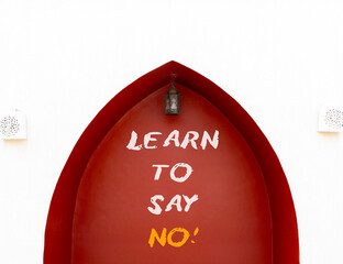 Learn to say no symbol. Concept words phrase Learn to say no on beautiful brown wall. Beautiful...