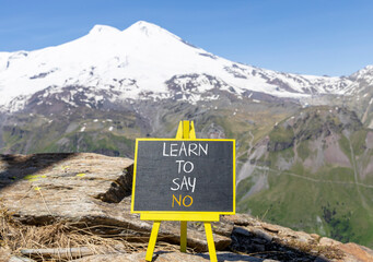 Learn to say no symbol. Concept words phrase Learn to say no on beautiful black blackboard....