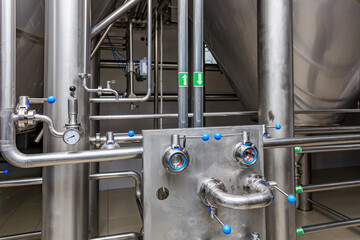 Industrial stainless steel pipes and valves in brewery equipment