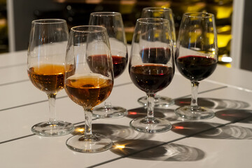 port wine testing, glasses with drink - white and red