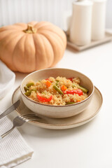 Healthy quinoa bowl with vegetables and pumpkin.