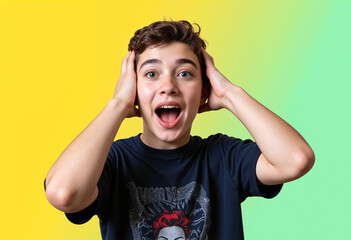Amazed Teenage Boy Reacting to Exciting News on Yellow-Green Gradient Background