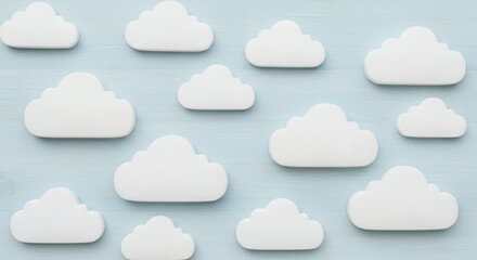 Fototapeta premium White Clouds Pattern on Light Blue Background: A Serene Minimalist Design