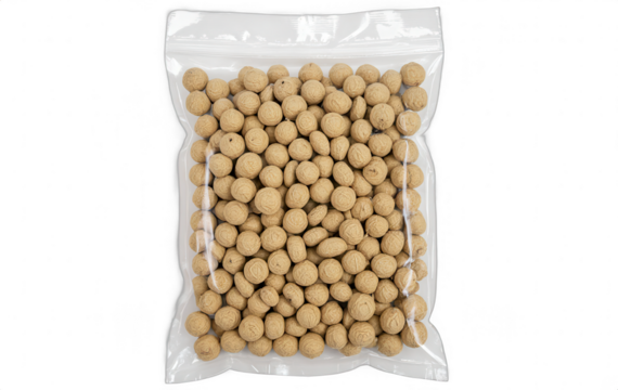 Close-up of a Transparent Plastic Bag Filled with Small Round Light Brown Natural Material Balls for Decorative and Craft Use