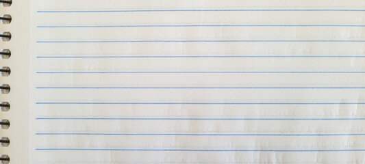 blank notebook paper with blue lines
