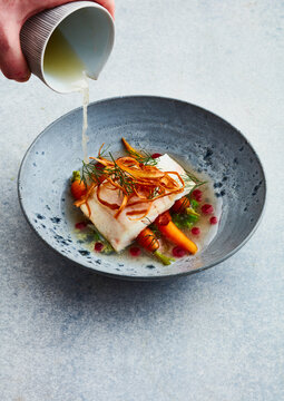 fish with broth and vegetables